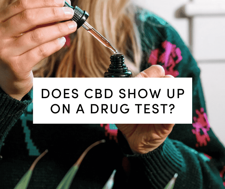 Woman holding CBD tincture and dropper