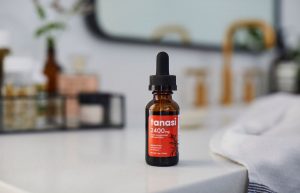 Tanasi CBD tincture on countertop