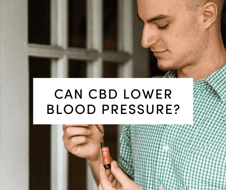 Man in green shirt holding Tanasi CBD tincture