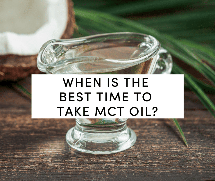 Coconut MCT oil in glass container on wooden table with coconut