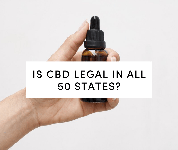 Woman holding cbd tincture
