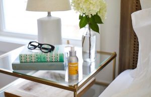 Tanasi CBD lotion on nightstand 