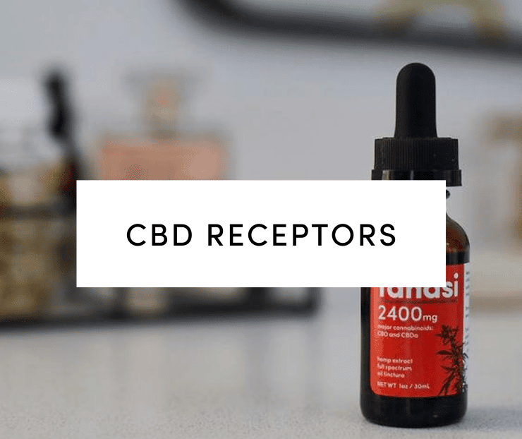 Tanasi CBD tincture on white countertop
