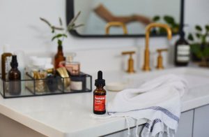 Tanasi CBD tincture on countertop