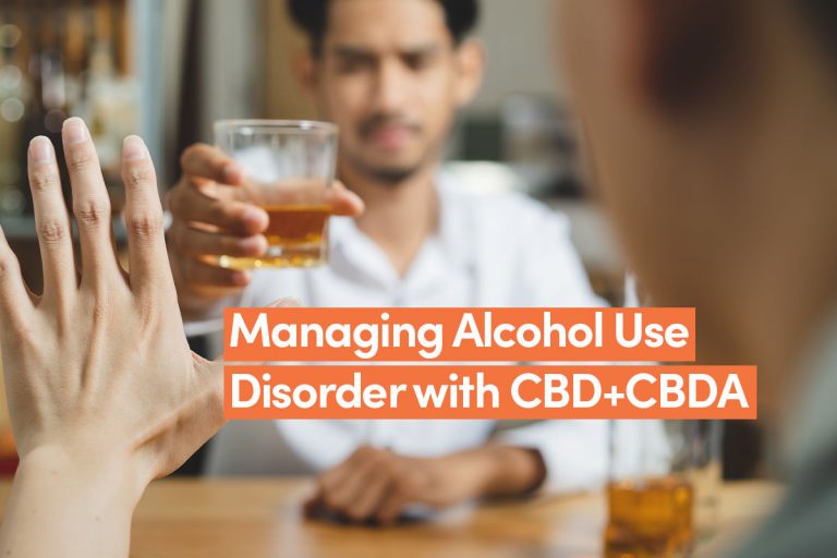 Image of a man refusing an alcohol drink because he has alcohol use disorder